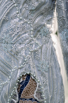 Close Up The Bride's Sage Green Wedding Gown Was Photographed Outdoors