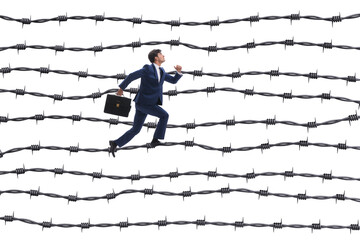 Businessman in barbed wire concept