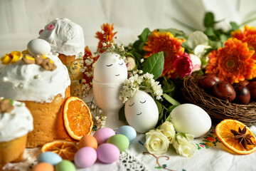 Easter and Easter eggs with flowers on the table