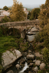 Fototapeta na wymiar roman bridge over a river