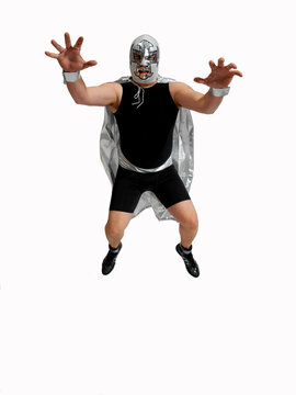 A Mexican wrestler makes an intimidating pose.