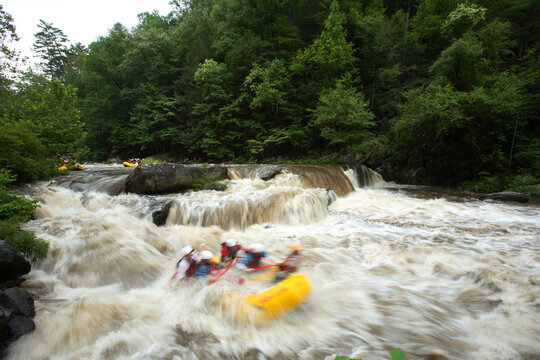 Zoom blur image of unknown rafters running Bear Creek Falls on the Cheoah River near Robbinsville, NC