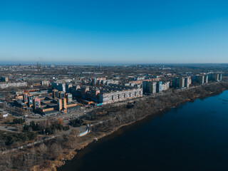 Top view of the left bank. Solnechny district, Dnipro, Ukraine. Residential houses, sleeping area. Panoramic view. Ukrainian city before the war.