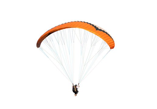 The sportsman flying on a paraglider. isolated on transparent background with clipping path. Beautiful paraglider in flight  with clipping path and alpha channel. for both printing and web pages. 