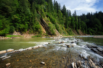 Threshold of a mountain river, among mountains