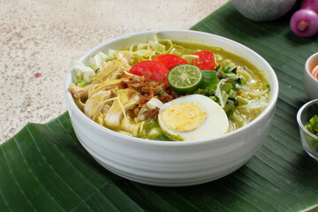 soto ayam, chicken soup with a yellow sauce