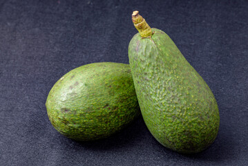 Avocado fruit, Variety: Fuerte, Black felt background