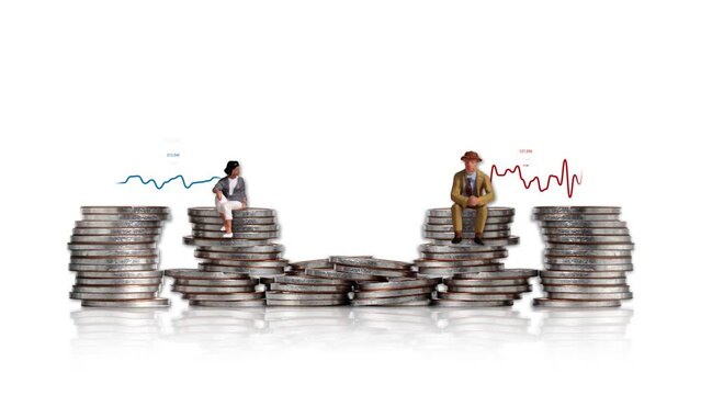 Coins and miniature people. Concept of successful investment choices.
