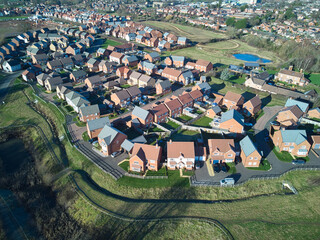 aerial view of a new edge-of-town housing development in the UK