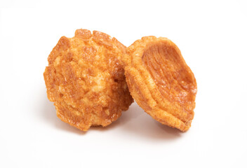 Japanese snack food. Fried crispy rice crackers isolated on white background