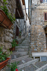 Fototapeta na wymiar An old atmospheric city with narrow and cramped quiet streets and stairs