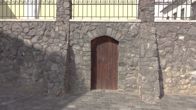 old wooden doors in a stone castle