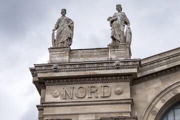 Architectural fragments of North Station (Gare du Nord, 1864) - one of the six large termini in Paris, largest and oldest railway stations in Paris. France.