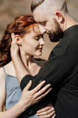 pregnant girl and boyfriend on high hills