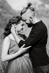 pregnant girl and boyfriend on high hills