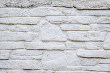 Background, texture of a wall made of gray concrete, stone gray bricks. Photography, abstraction, copy space.