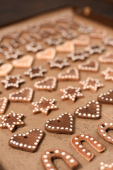 Rows of cookies shaped like hearts and stars. Valentine's Day, Christmas background. Symbol. Selected focus, vertical.