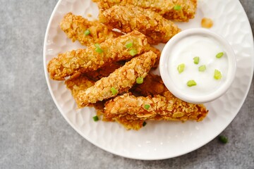 Potato chips breaded Chicken strips | Game day appetizers, selective focus