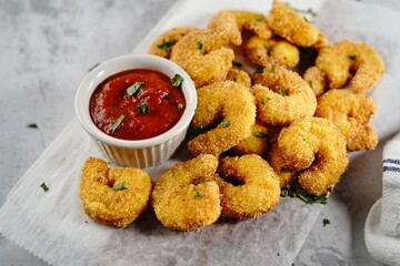 Homemade Popcorn shrimps breaded with cornmeal | Game day appetizer, selective focus