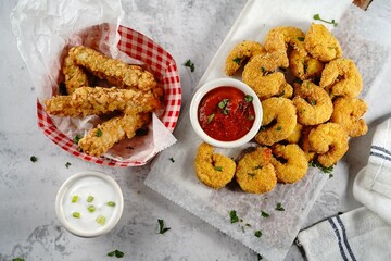 Homemade Popcorn shrimps breaded with cornmeal | Game day appetizer, selective focus