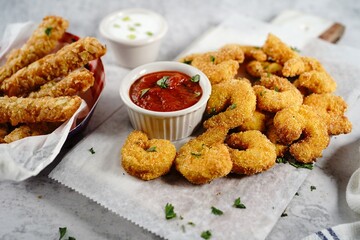 Homemade Popcorn shrimps breaded with cornmeal | Game day appetizer, selective focus