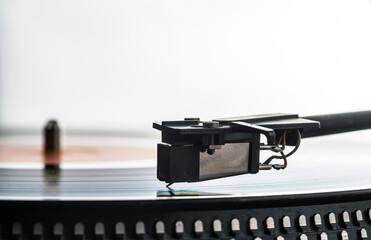 Turntable vinyl record player. Sound technology for DJ to mix & play music. The needle on a vinyl record.