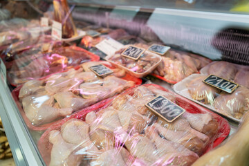 Chicken on a shelf with prices