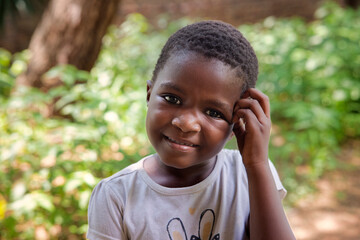 african girl scratching her head