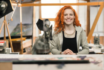  Portrait of an artist happy beauitful adorable perfect orange curly hair girl