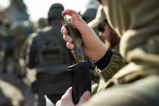 Charging the store with airsoft balls.