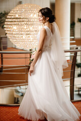 Naklejka premium beautiful portrait of a bride in a wedding dress
