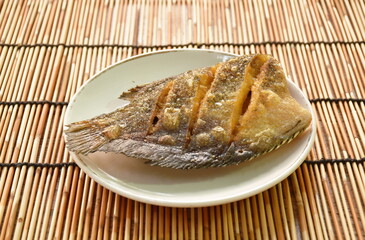 deep fried snake skin catfish or gourami on dish
