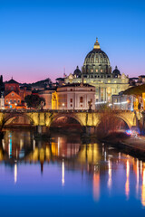 Fototapeta na wymiar St. Peter's Basilica in Vatican City on the Tiber River through Rome, Italy