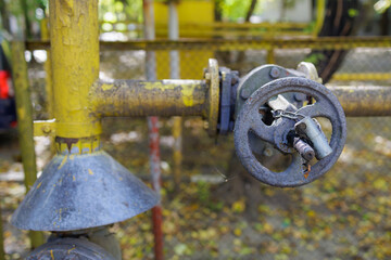Gas valve closed with a padlock. Concept of sanctions and embargo.