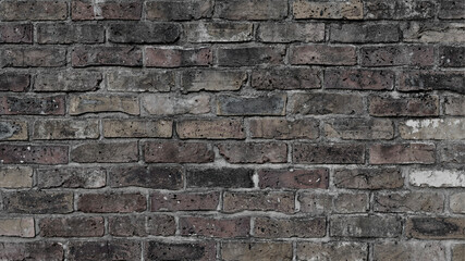 煤けた汚れがおしゃれな、ヴィンテージ煉瓦の壁
