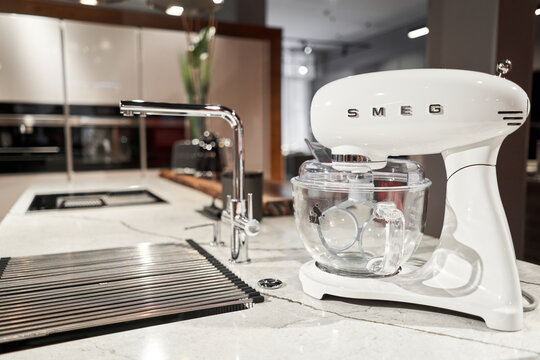 Russia, Nizhny Novgorod - January 21 2022: Kitchen appliance Store. On a kitchen worktop close-up SMEG branded mixer, appliance for easy living, a popular Italian manufacturer