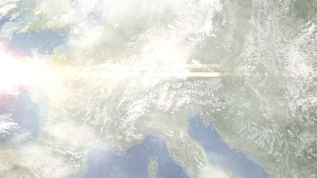 Earth zoom in from outer space to city. Zooming on Rankweil, Austria. The animation continues by zoom out through clouds and atmosphere into space. Images from NASA