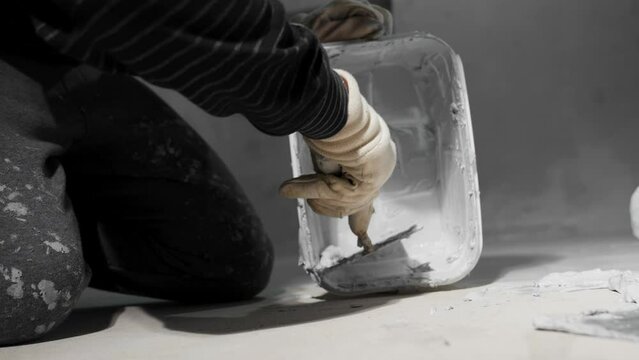 bucket with waterproofing of bathroom floors and walls