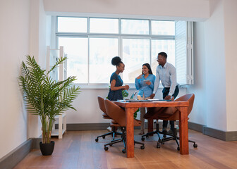 Wide shot of office scene, boardroom meeting three people standing modern work