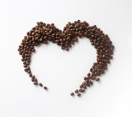 Coffee lover. Coffee beans arranged in a beautiful heart shape on white background.  Festive card for Valentines Day. top view. flat lay. 3D illustration