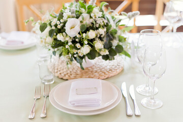 Table setting and flower composition