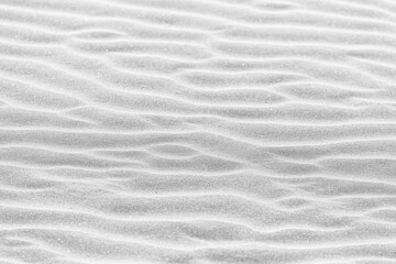 Fototapeta na wymiar waves of sand formed by the wind in the desert