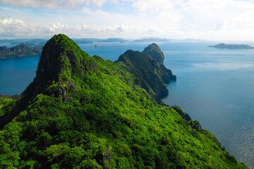 Amazing reef and mountains in the sea of Palawan, Philippines (aerial view)