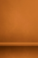 Empty shelf on an orange brown concrete wall. Background template. Vertical mockup