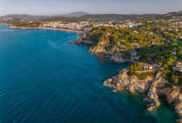 Fototapeta na wymiar Aerial view to Spanish coast of Costa Brava in Lloret de Mar, Catalonia, popular travel destination by the sea