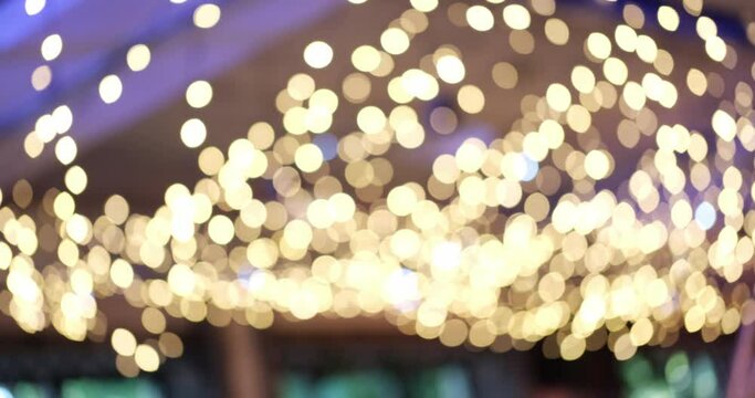 Defocused yellow lights. Bright lights close-up.