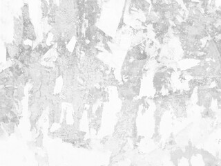 Black and white old painted peeling cement wall surrounding pieces of paper on it, Abstract distressed floor cement or concrete wall with space for your text, black and white grunge texture.