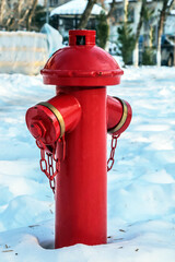 Red fire hydrant outdoors closeup photo