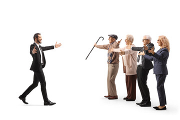 Obraz premium Full length profile shot of a businessman meeting his family