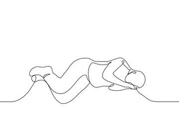 man lying on the floor or ground using his own hands instead of a pillow - one line drawing vector. concept homeless, sleeping on the street